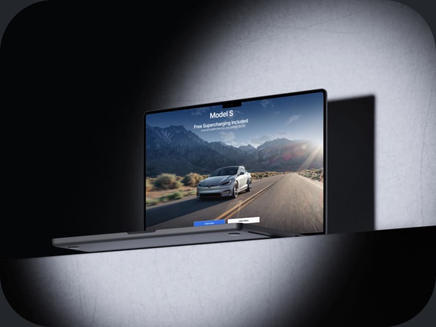 Tesla Model S page shown on a laptop mockup